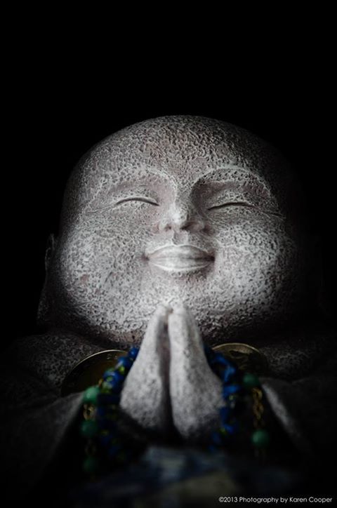 Photo of praying Buddha